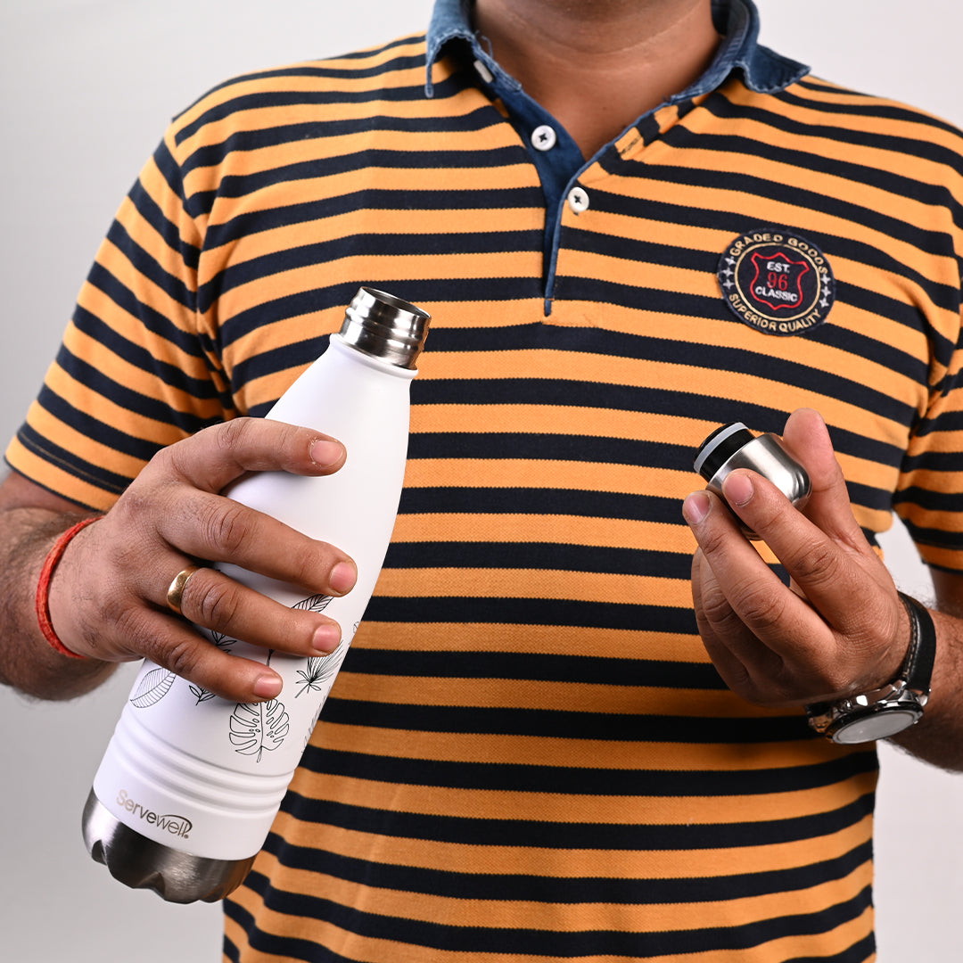 Premium Photo | Men's watches and an open bottle of black eau de toilette  lie on a dark textured background fragrance for men